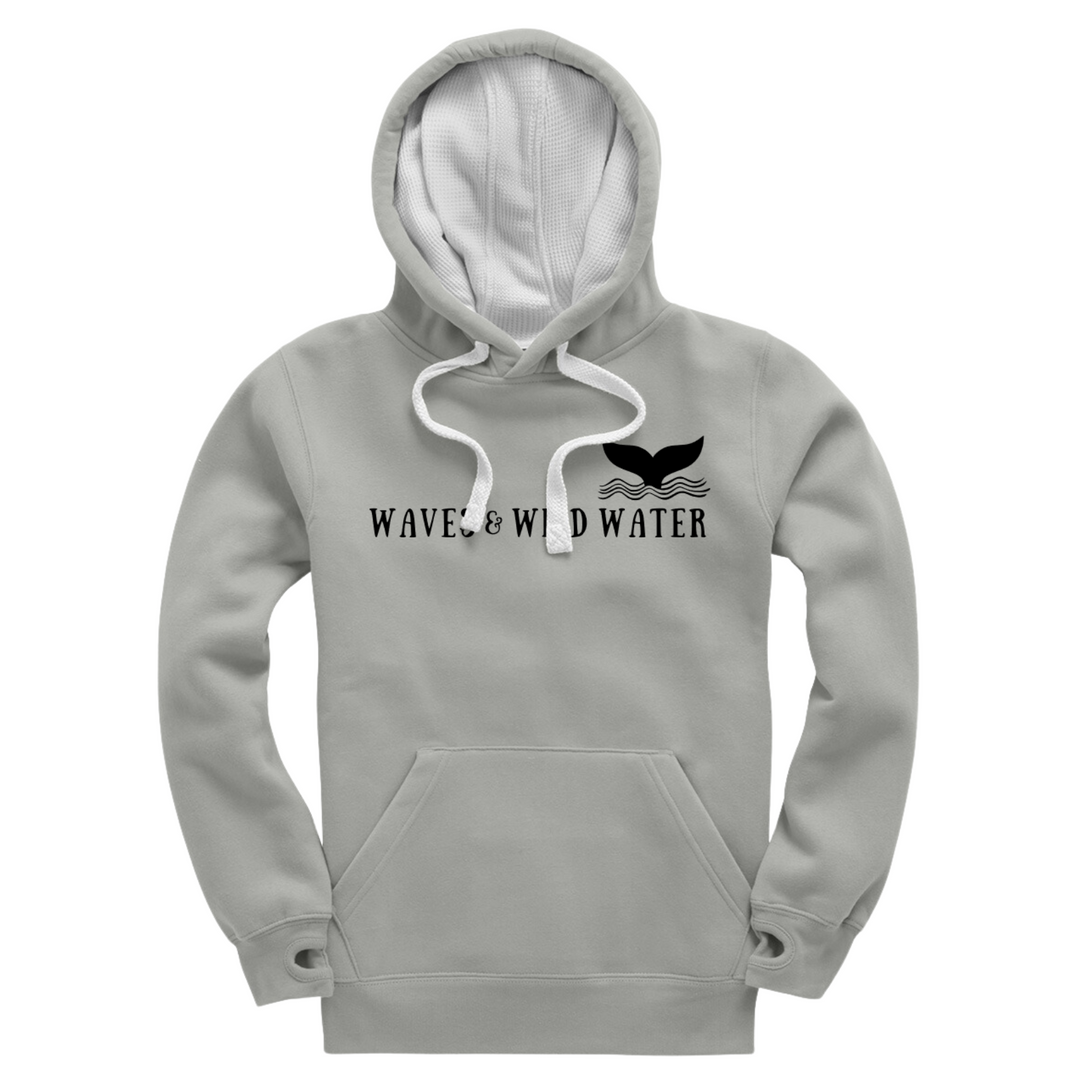 Waves and Wild Water grey mist hoodie with white inner hood and matching white draw cord. The Waves and Wild Water logo is hand screen printed across the front in black water based ink. We love to cosy up in this hoodie after a cold water swim especially as it has thumb holes.