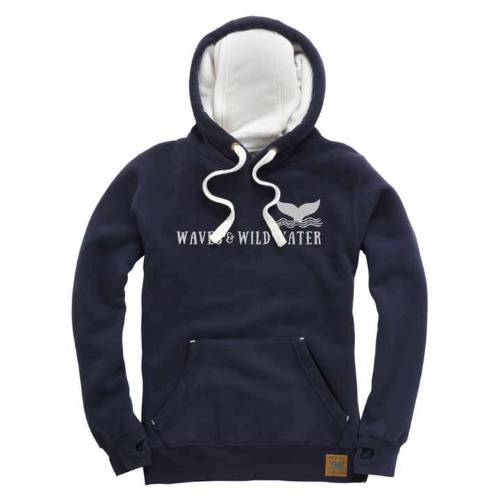 The front of our exclusive Waves and Wild Water heavyweight hoodie in navy blue. This hoodie has a contrasting white waffle hood lining and matching cord. The logo is displayed across the front in metallic silver print.